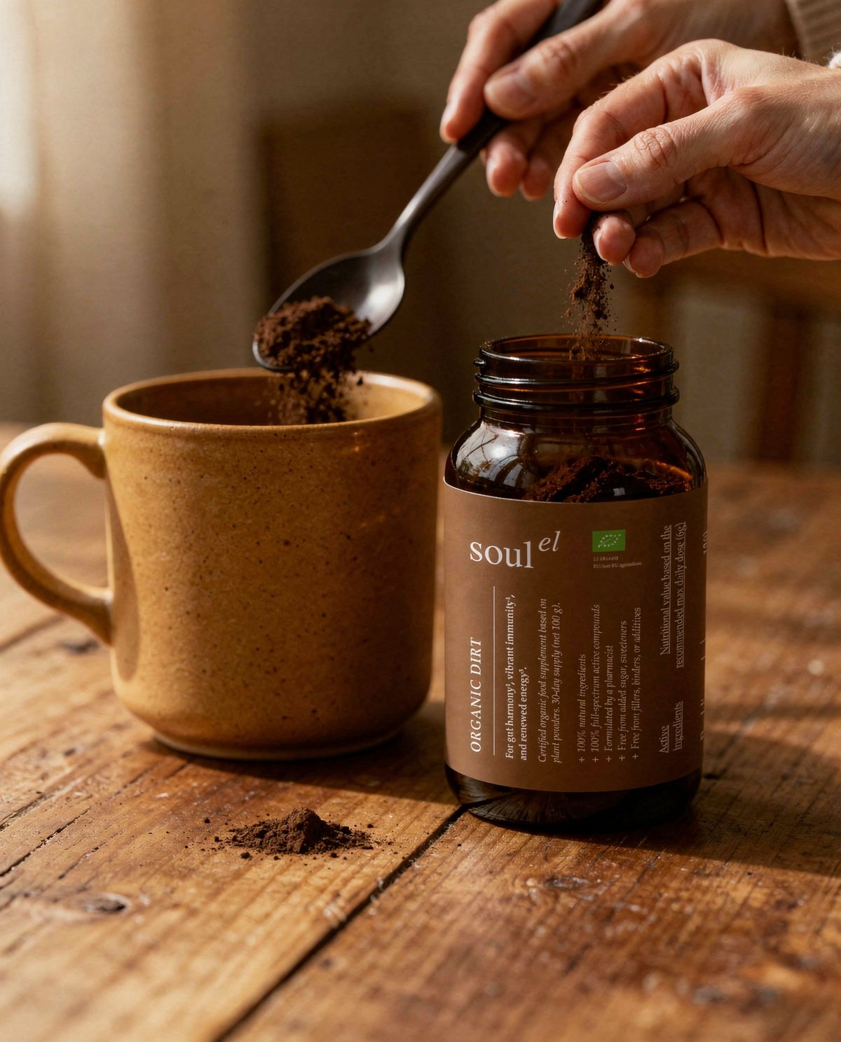 Stirring Soulel Organic Dirt into a warm mug
