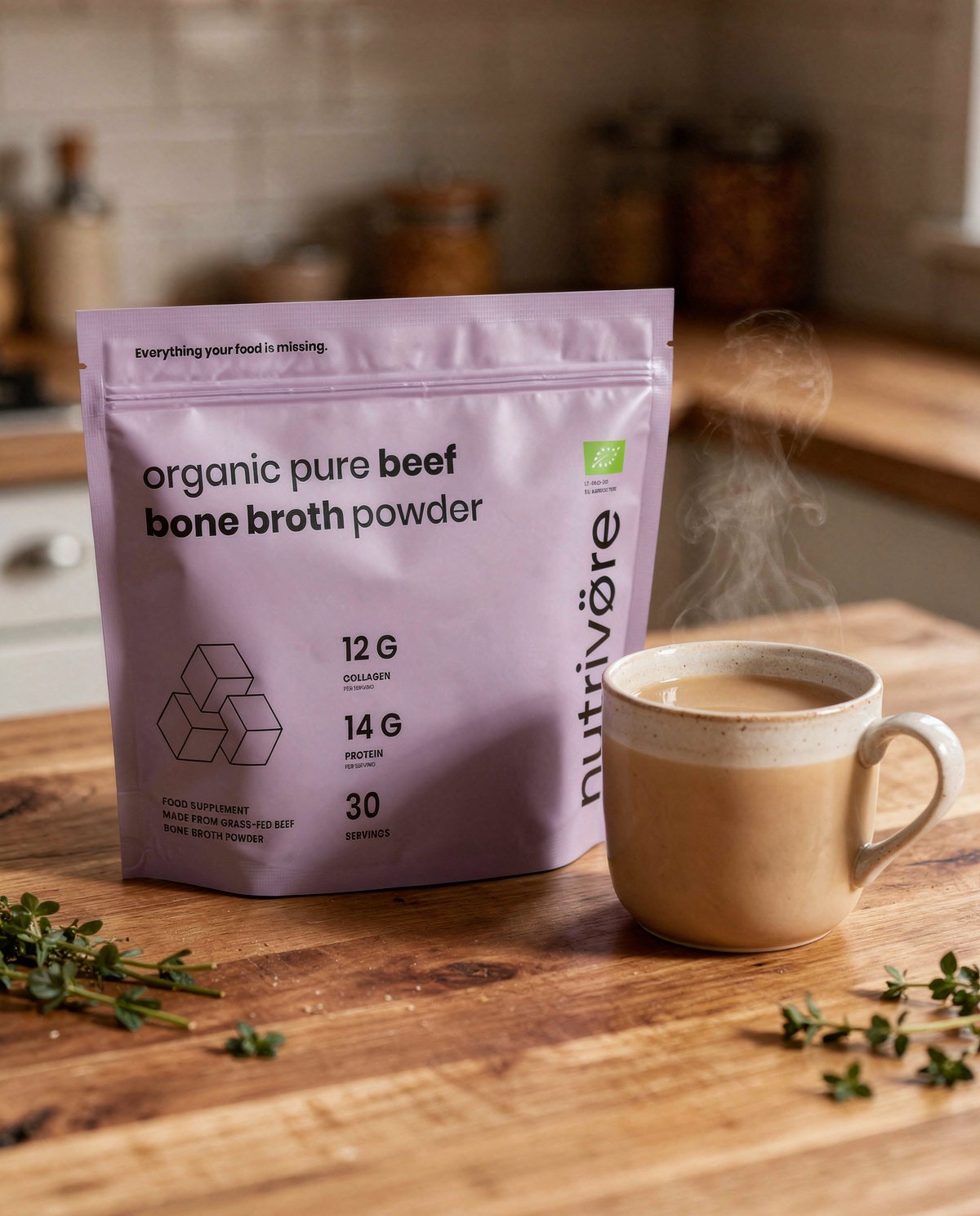 Nutriø̈tēca Bone Broth pouch beside a steaming mug of broth